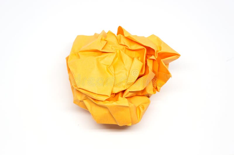 Crumpled orange paper ball stock photo