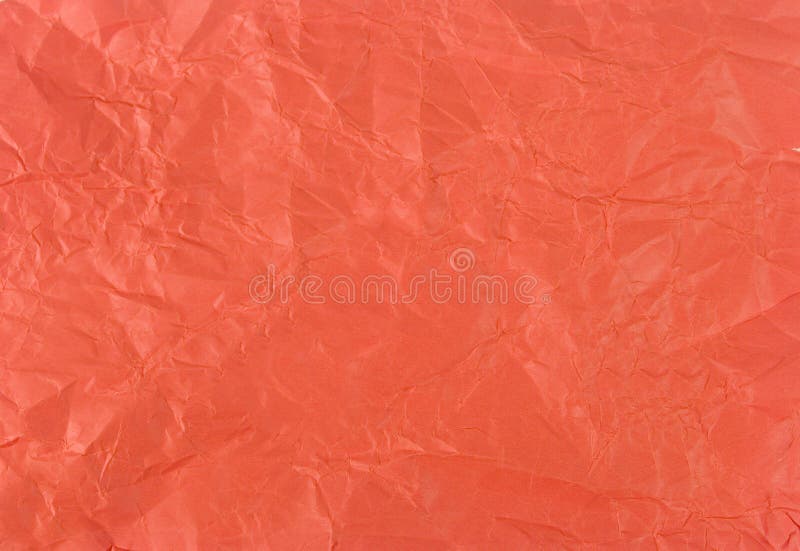 Crumpled red paper stock image