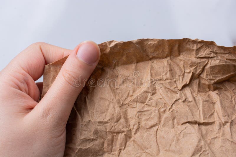 Crumpled Paper Texture Wrinkled Color Paper In Hand Stock Image crumpled-paper-texture-wrinkled-color-paper-in-hand-stock-image