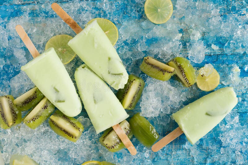 Crushed ice cubes and lemon, kiwi, homemade ice cream on vintage