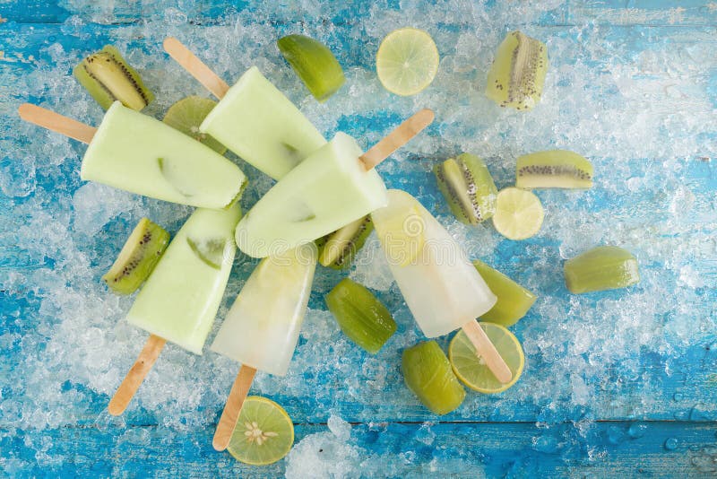 Crushed ice cubes and lemon, kiwi, homemade ice cream on vintage