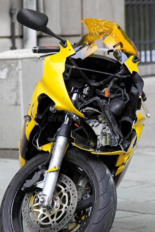 Unrecognizable motorcycle in bad traffic accident. Unrecognizable motorcycle in bad traffic accident