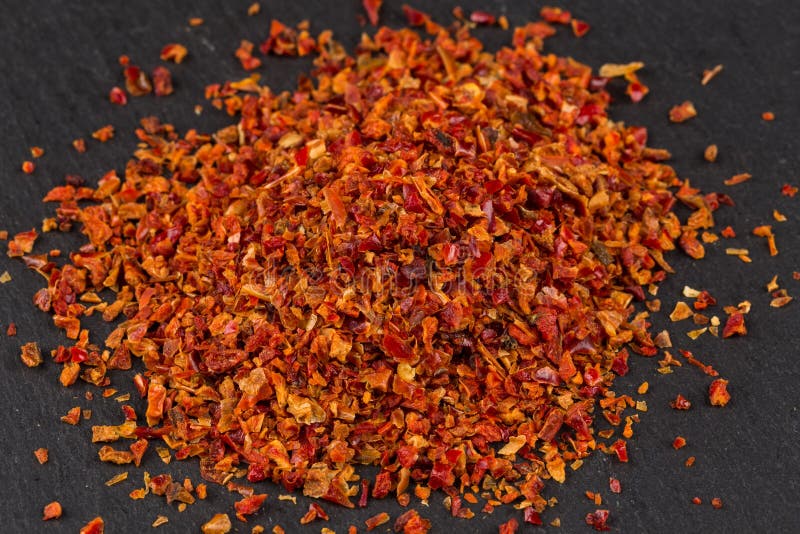 Crushed red chili pepper stock photo. Image of macro 71823262