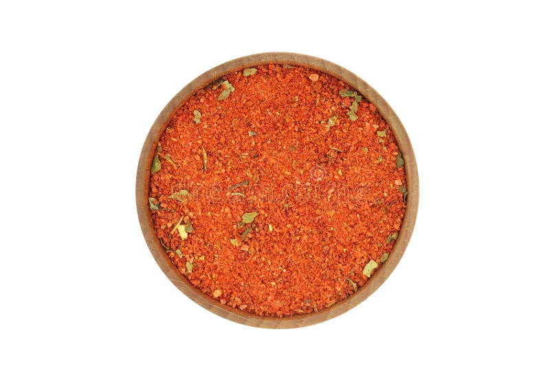Crushed red spices in a wooden bowl royalty free stock photography