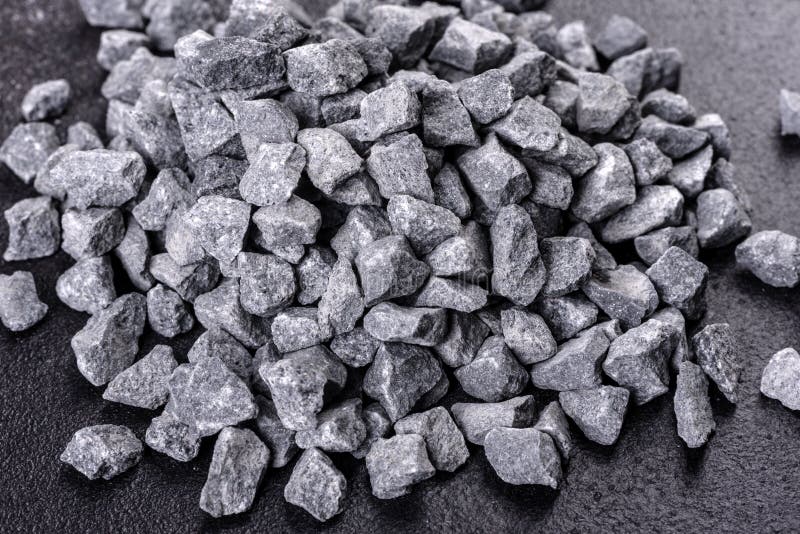 Crushed stone abstract textured background. The rough texture of the stone. Building material background.