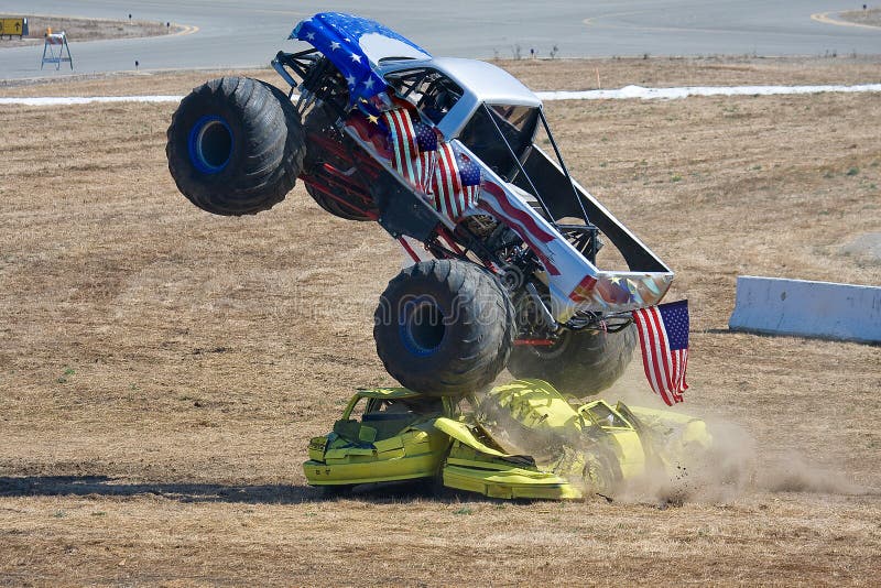 Monster Truck Attacking Cars Stock Photo Image of wheel, wheels 21340170