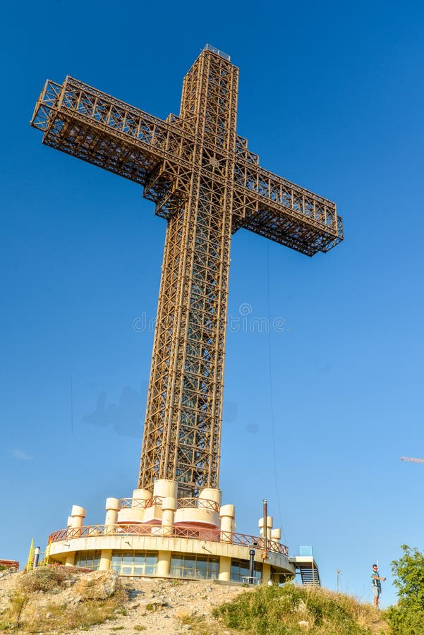 Beneath the giant crucifix in Skopje, a 66 meter tall cross, built on top Vodno Mountain in 2002 to commemorate 2,000 years of Christianity in Macedonia. Beneath the giant crucifix in Skopje, a 66 meter tall cross, built on top Vodno Mountain in 2002 to commemorate 2,000 years of Christianity in Macedonia