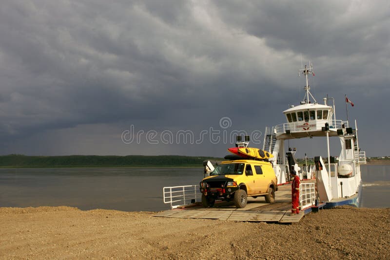 Ferry crossing on MacKenzy River above Arctic Circle, NW Territories, Canada. Ferry crossing on MacKenzy River above Arctic Circle, NW Territories, Canada