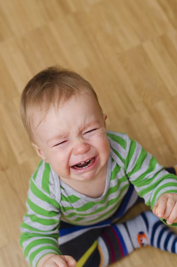 Crying baby boy stock photo. Image of grimacing, front - 36492642