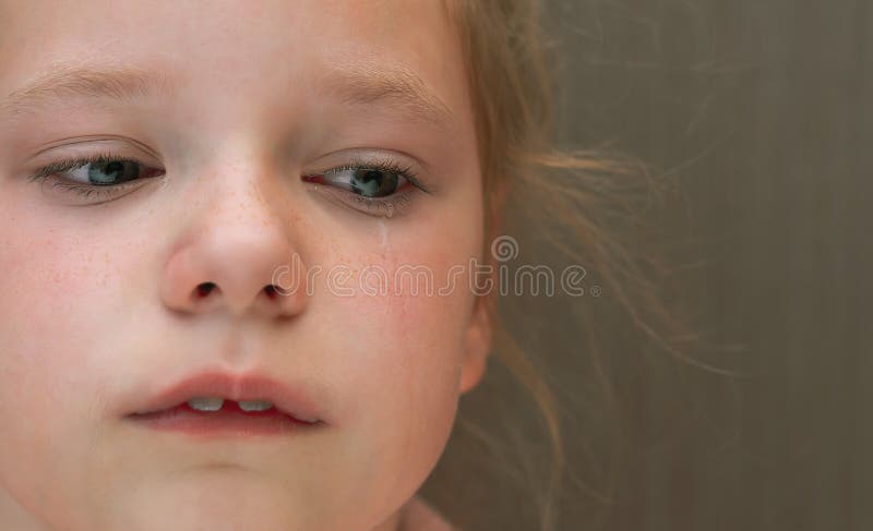 Crying kid girl closeup