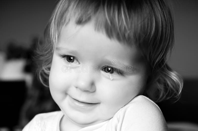 Crying little girl stock photos