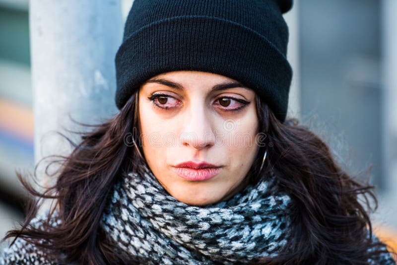 Crying Sad Beautiful Teenager with Black Hat and Grey Coat - Close Up ...