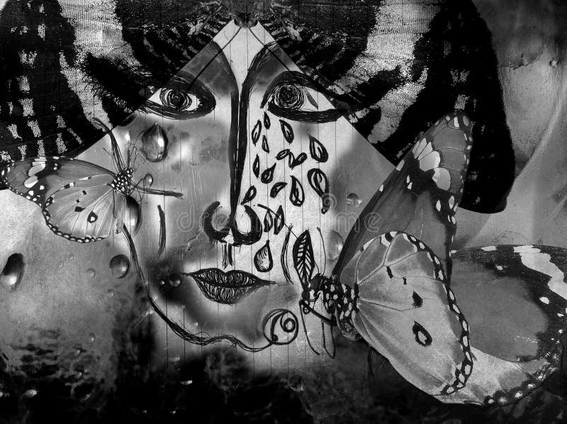 Crying woman face. Harlequin bizarre face drawn by pen on paper lined sheet. Jester and butterflies