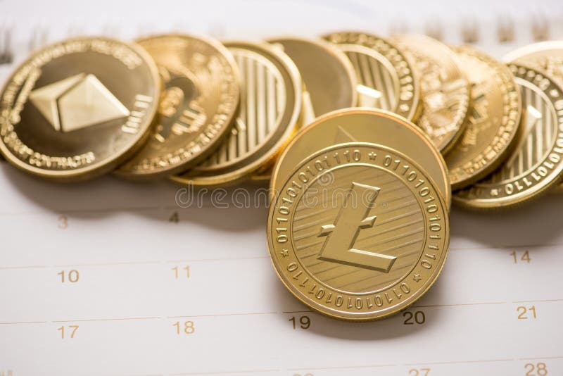 Cryptocurrency golden Bitcoin,Litecoin ,Ethereum coin on calendar, digital currency concept. Cryptocurrency golden Bitcoin,Litecoin ,Ethereum coin on calendar, digital currency concept.