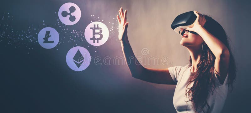 Cryptocurrency with woman using a virtual reality headset royalty free stock photography Cryptocurrency with woman using a virtual reality headset royalty free stock photography