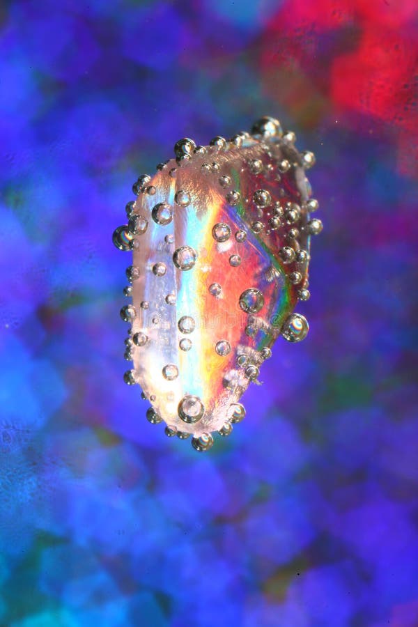 Crystal and Bubbles in Liquid Stock Image Image of covered, falling