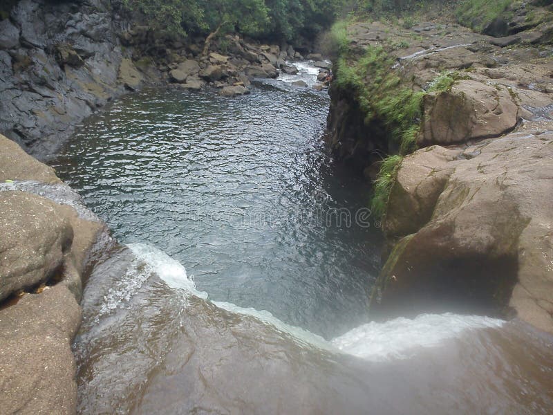 Lake With Clear Crisp Water Surrounded With Mountaineous Scenery Stock