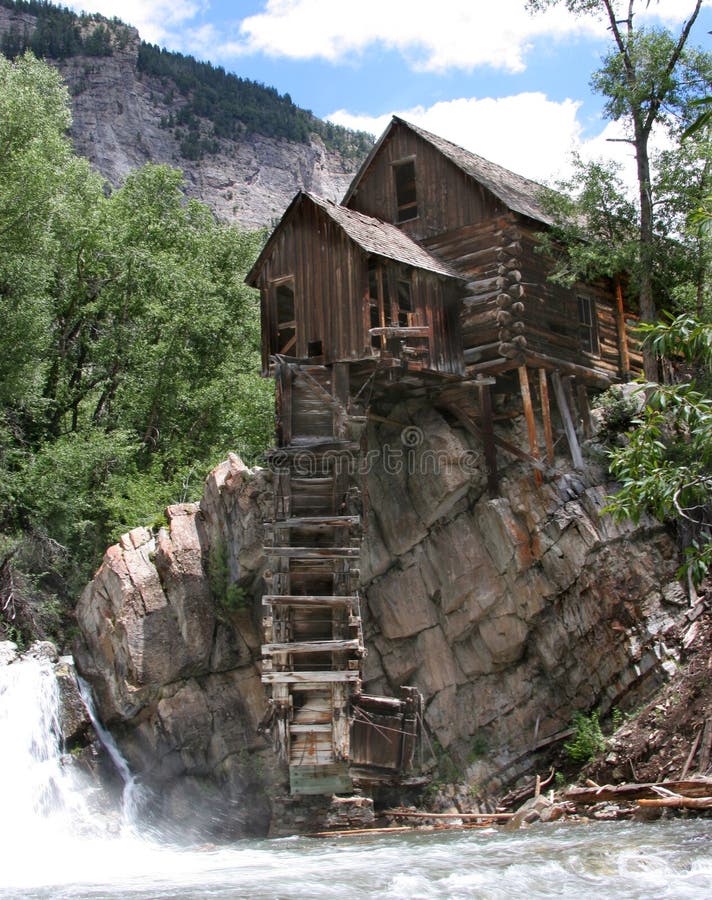 Old ore crushing mill precariously perched on an outcropping of rock just above the Crystal River is one of the most photographed sites in Colorado. Old ore crushing mill precariously perched on an outcropping of rock just above the Crystal River is one of the most photographed sites in Colorado.