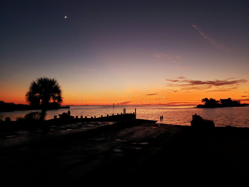 Crystal river Florida sunset gulf beach fishing pier sky island palm tree