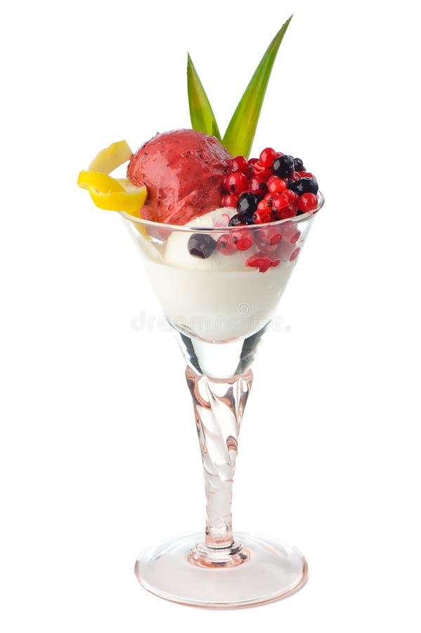 Delicious ice cream in tall glass with berries and decorative green leaves, white background. Delicious ice cream in tall glass with berries and decorative green leaves, white background.