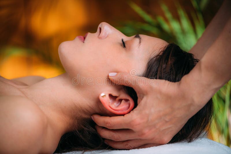 CST therapist Massaging Womanâ€™s Head. Craniosacral Therapy Massage royalty free stock photography