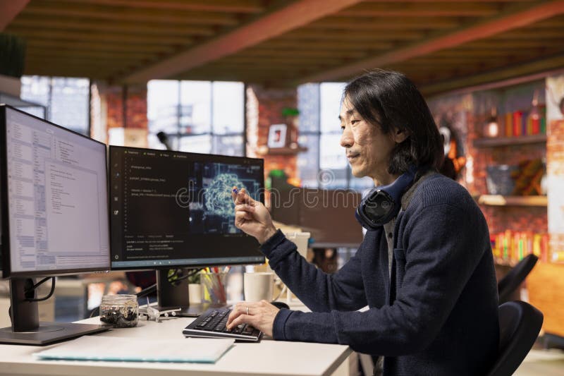 CTO manager in artificial intelligence focused startup coding royalty free stock photo