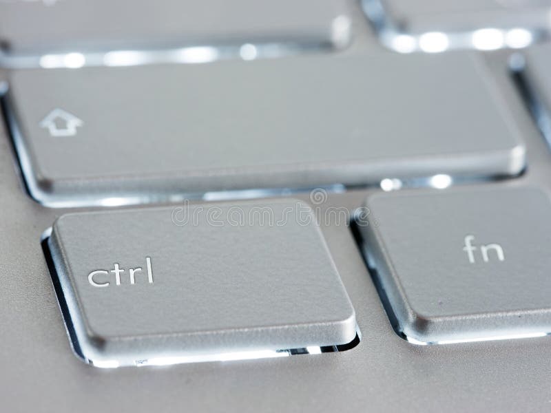 Ctrl - клавиша ctrl на серебряной клавиатуре ноутбука стоковое изображение Ctrl - клавиша ctrl на серебряной клавиатуре ноутбука стоковое изображение