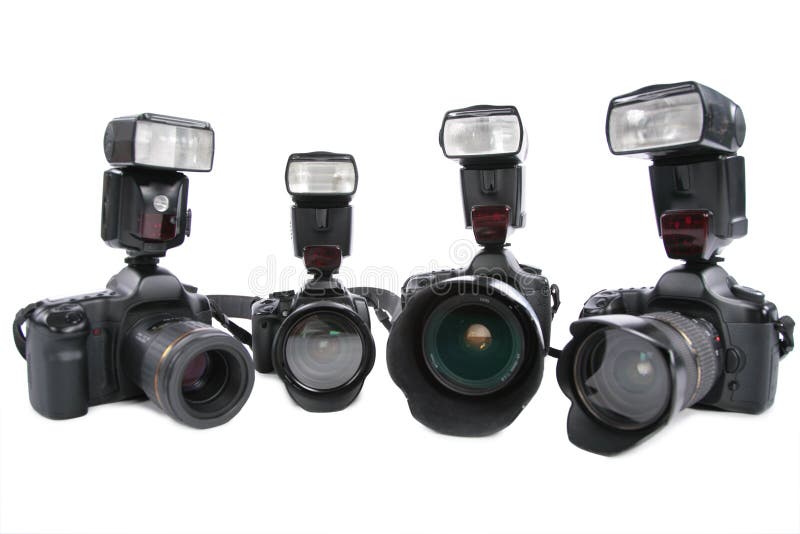 Four Cameras with flashes on a white background. Four Cameras with flashes on a white background