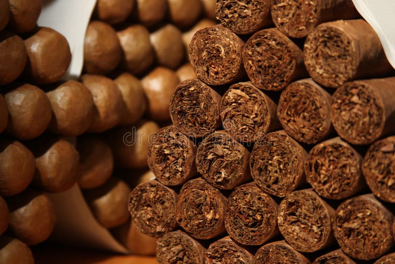 View of a pile of cuban cigars. View of a pile of cuban cigars