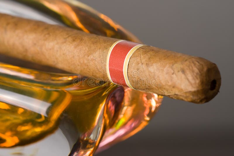 Cuban cigar in ashtray stock photo. Image of leisure 10625700