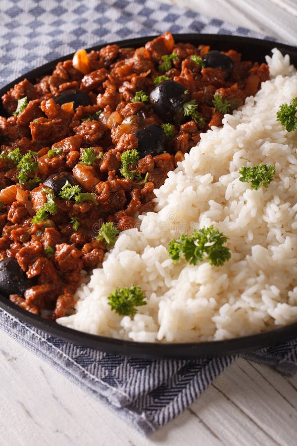 Cuban Food: Picadillo with a Side Dish of Rice Close-up. Vertical Stock