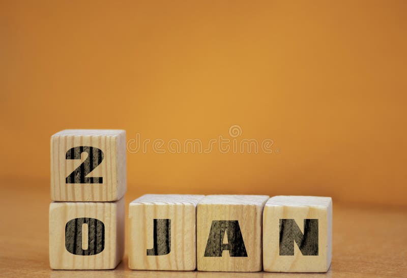 Cube shape calendar for January 20 on wooden surface with empty space for text, new year Wooden calendar with date, January cube royalty free stock photos