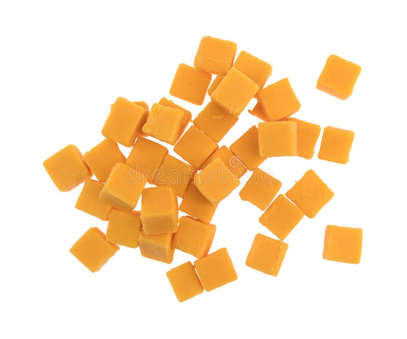 Cubed mild cheddar cheese on a white background