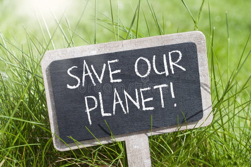 Cubes, dice and black chalkboard with Save our planet and go green