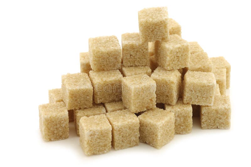 Sugar cane cubes on a white background. Sugar cane cubes on a white background