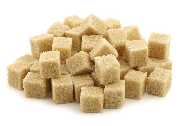 Sugar cane cubes on a white background. Sugar cane cubes on a white background