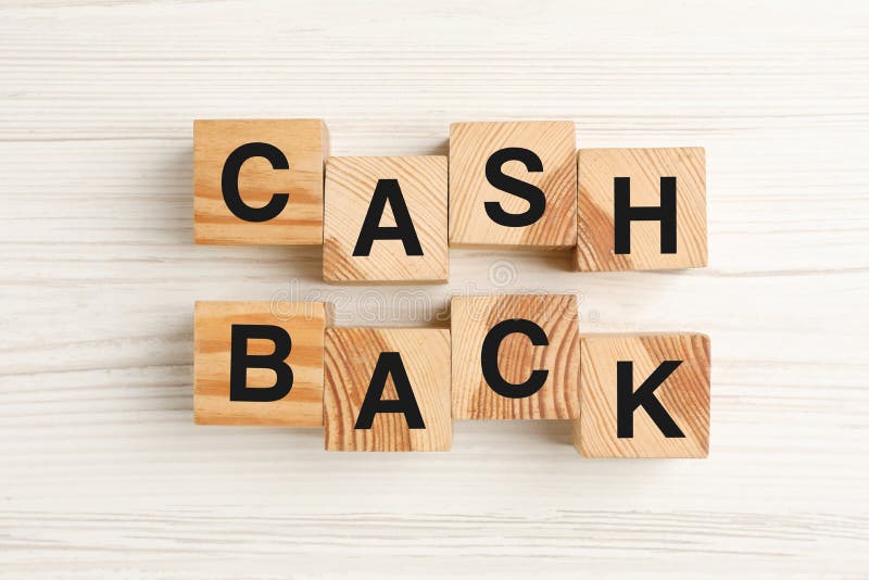Cubes with word Cashback on white wooden table, flat lay royalty free stock photos