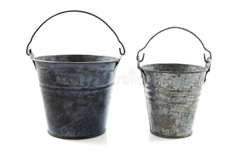 Two old metal vintage buckets over white. Two old metal vintage buckets over white