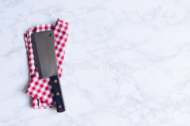 Cuchillo de la carne del vintage sobre la tabla de mármol fotografía de archivo Cuchillo de la carne del vintage sobre la tabla de mármol fotografía de archivo