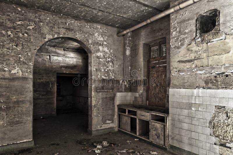 Interior shot of an old and decaying kitchen. Interior shot of an old and decaying kitchen