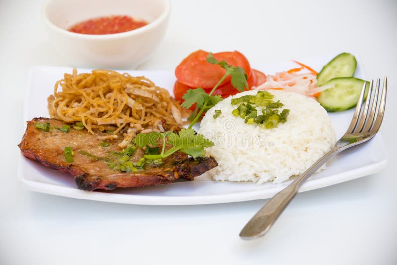 Cucina vietnamita - braciola di maiale arrostita con riso