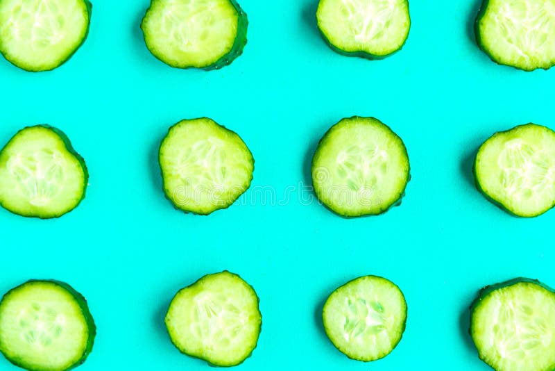 Cucumber pattern on bright blue background.