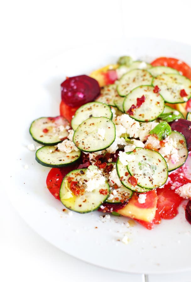Cucumber Salad with Tomatoes, Cottage Cheese and Herbs Stock Photo