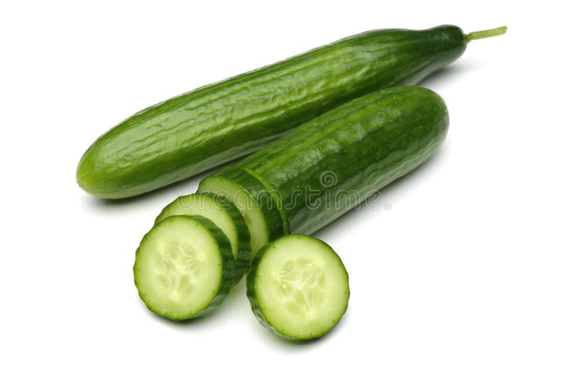 Cucumbers and Cucumbers Slices. Isolated on white background royalty free stock photo