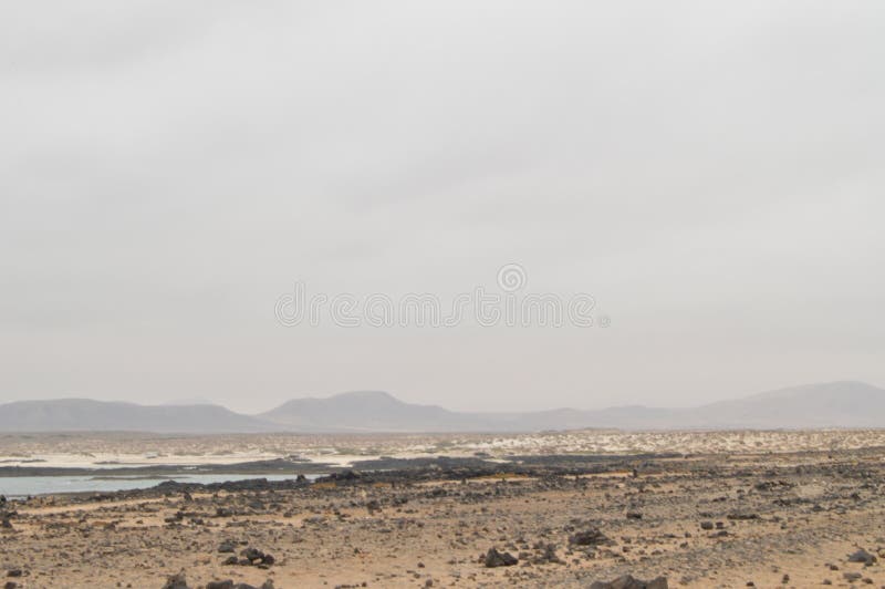 Cudowny Podpalany Pełny Powulkaniczni kamienie W Bajo Ballena Lipiec 8, 2013 El Cotillo La Oliva Fuerteventura wyspy kanaryjskie obrazy stock Cudowny Podpalany Pełny Powulkaniczni kamienie W Bajo Ballena Lipiec 8, 2013 El Cotillo La Oliva Fuerteventura wyspy kanaryjskie obrazy stock