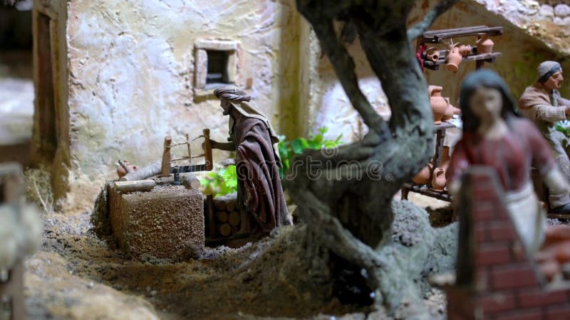 Cuenca, Ecuador - 2019-01-03 - Animated Christmas Nativity Scene - Carpenter Saws Wood