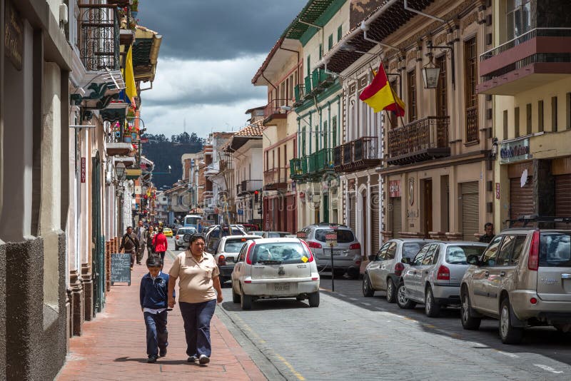 Cuenca, Ecuador - Local people walking around in a blue sky day in the old town in Cuenca, Ecuador, South Ameri