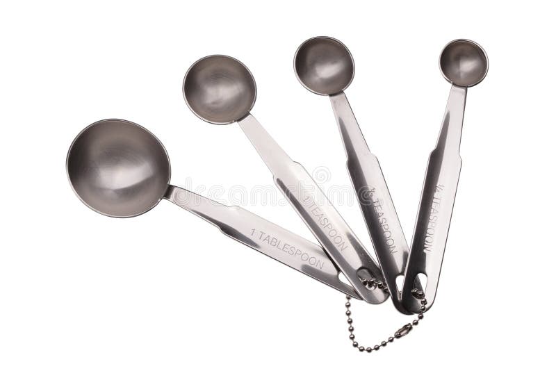 Set of metallic measuring spoons isolated on white background. Set of metallic measuring spoons isolated on white background.