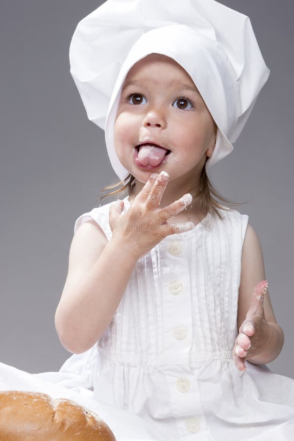 Cuisine and Cooking Concepts and Ideas. Portrait of Lovely Cute Caucasian Girl Posing as Cook.