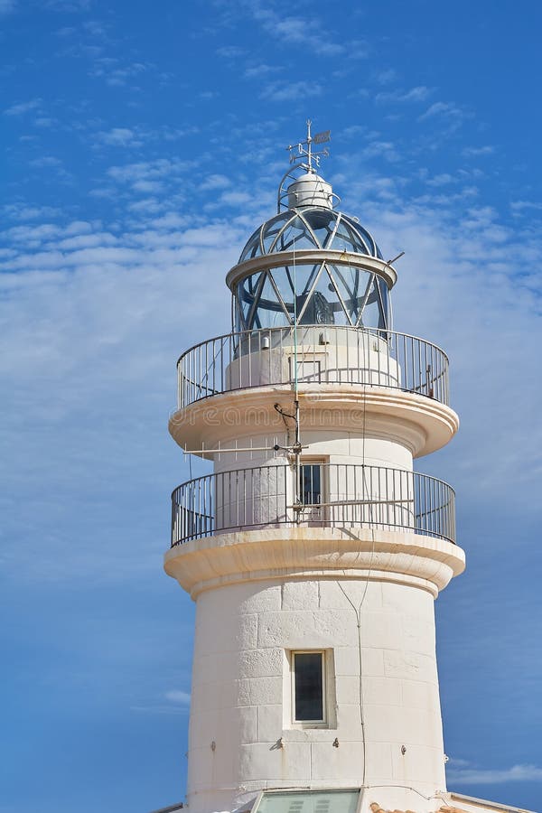 Cullera Lighthouse in the Mediterranean Sea, Valencia, Spain Stock